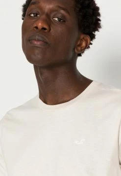 Hollister Co. CREW ICON SOLIDS - T-Shirt Basic - Tan | Herren -Hollister Geschäft 0dd9da826cb7456fb77f5d3bec602cf2